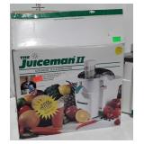 The Juiceman II automatic juice extractor,