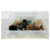 Plastic tote with lid, cotton buff, syringes,