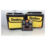 Two Steelers lunchbox coolers and a commemorative