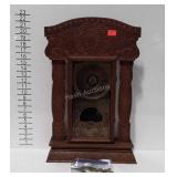 Antique gingerbread parlor clock with key and