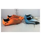 Two pairs of puma kids cleats size 4 and 13c, used
