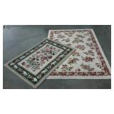 Two scatter rugs, floral, larger measures 65 x 46