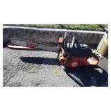 Dolmar Chainsaw, has bar cover, 20" bar,