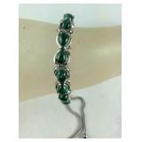 11.98ct African malachite platinum bond and