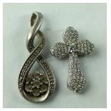 Two Sterling silver and diamond pendants