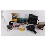 3 Cameras & 2 movie cameras (not tested), bulbs &