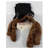 Fur stole, home electrolysis kit and Eddie Bauer