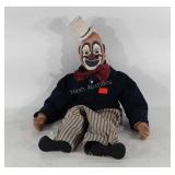 Signed and numbered carved wood clown doll with