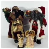 Holiday decor, two Santa statues and two angel