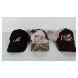 Three hats, one with tags