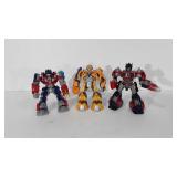 Action figures, three transformers, includes