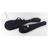 Instrument cases, one Harmony guitar case, and