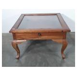 Wooden and glass display coffee table, includes