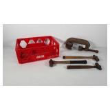 Clamp, ball peen hammers, and Coca-Cola crate