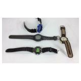 Four wrist watches