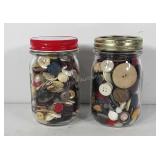 Two small Mason jars full of buttons, 3" × 5"