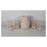 Ceramic 9" water pitcher and four poly seashell