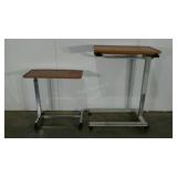 Two adjustable bedside tables, damage as shown