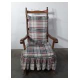 Wooden rocking chair with plaid cushions