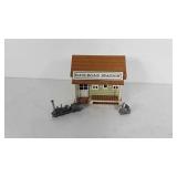 Railroad station music box and two metal train