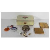 Floral tin, makeup compacts, political buttons,