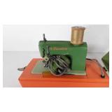 Signature Junior sewing machine with case, powers