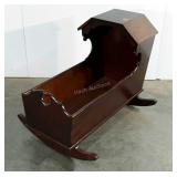 Rocker cradle,chew marks on one leg but nice