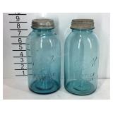 Two half gallon ball jars with lids