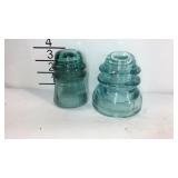 Two glass insulators, Hemingray and Whitall Tatum