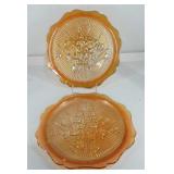 Glassware, two Jeanette marigold carnival glass
