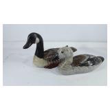 Two wooden decoys, duck and swan, 11", swans head