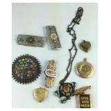 Brooches, locket pendants, and necklace