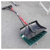 Two poly Snow Shovels