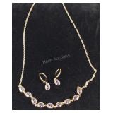 Simulated amethyst color diamond lever back and