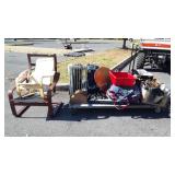 Skid of suitcases, lifeguard board, heater, two