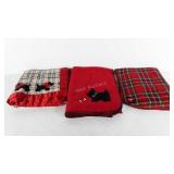 Three Scottish terrier themed blankets/throws