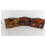 Three decorative lunch boxes, 10" × 5" × 8"