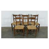 Five rush seat chairs, age worn