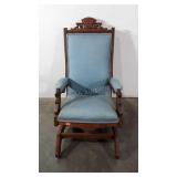 Victorian style blue upholstered rocking chair,