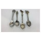 Four Scotty dog collector spoons one is marked