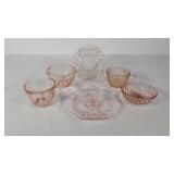 Pink Depression glass group, includes handled