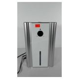 Dehumidifier with UV light, powers up, stands 14"