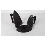 Cast irons, two flat and one sad