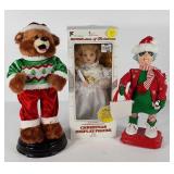 Three holiday dancing decorations, bear and
