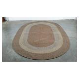 Oval braided rug, 74 x 108
