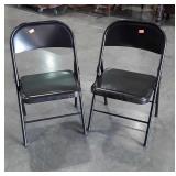 Two Black Metal Folding Chairs in nice condition
