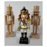 Three eight inch tall nutcrackers, two are ready