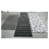 Four non-slip rugs, smallest measures 20 x 34, 2