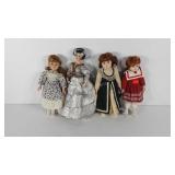 Four porcelain dolls, all without stands, 15" to