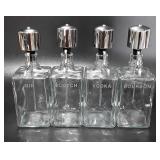 Four liquor pump dispensers, Gin, Scotch,  Vodka